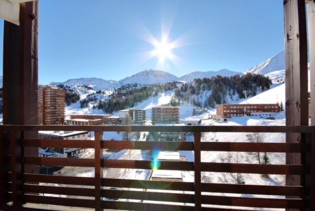 Sunlit view of Plagne Centre from the SnowBadgers balcony