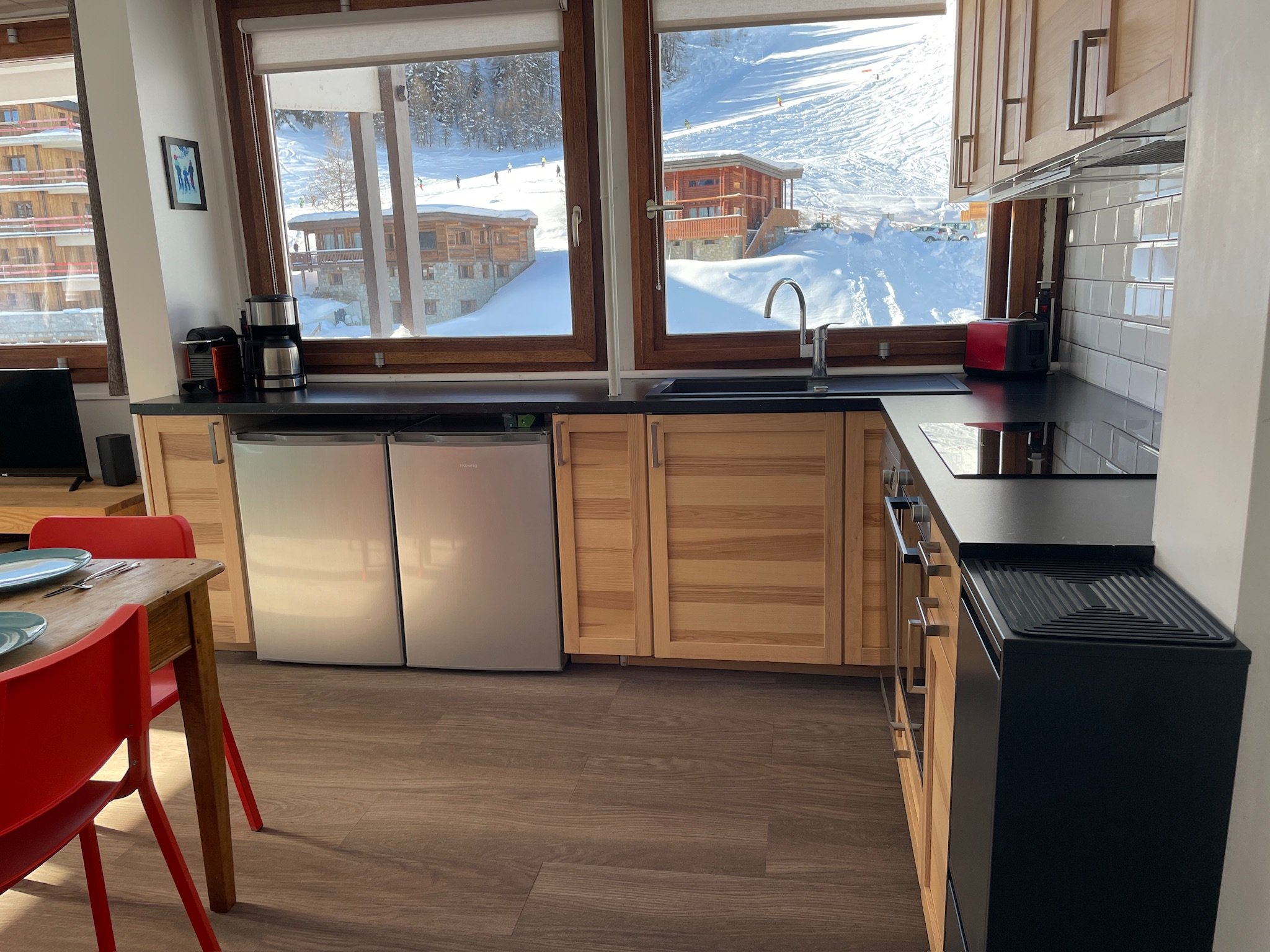 Kitchen along the slope-facing windows at SnowBadgers